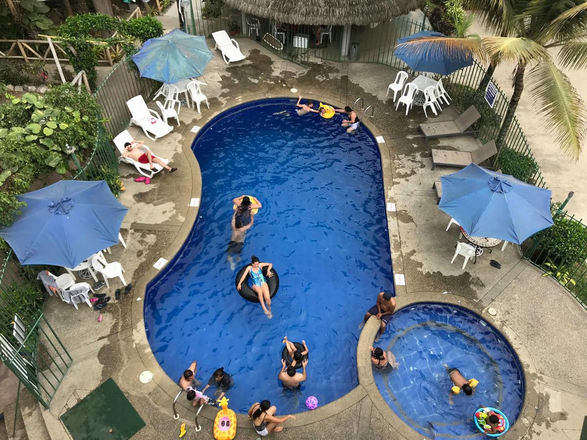 Hotel Pacifico Пуэрто-Лопес Номер фото
